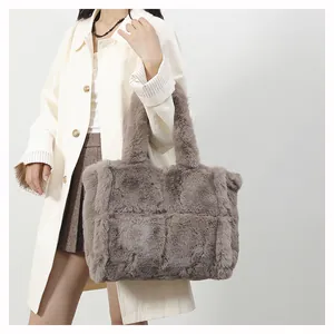 Detail of taupe faux fur quilted tote bag showing soft plush texture and large capacity