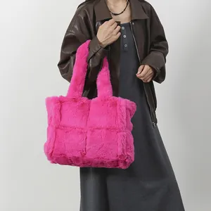 Pink faux fur tote bag with woven checkerboard pattern and large capacity