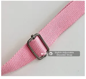 Detail of pink corduroy bag adjustable shoulder strap with gunmetal alloy buckle