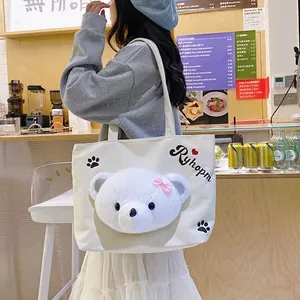 Cute white canvas tote bag with plush 3D bear head and polka dot bow for daily commute