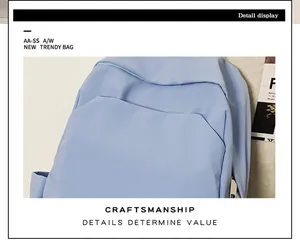 Detail view of a light blue waterproof backpack with flap closure and minimalist texture
