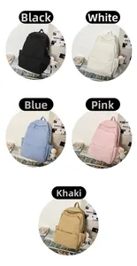 Waterproof backpacks shown in black, white, blue, pink, and khaki with cute duck charms