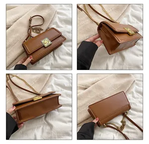 Detail view of brown shoulder bag showing gold clasp, metal chain strap and interior space