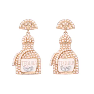 Dangle earrings featuring tequila bottle design with inlaid pearls and crystals