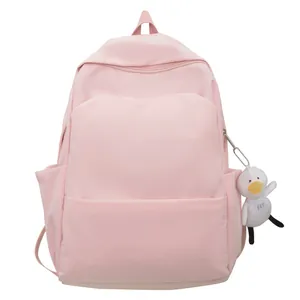 Minimalist light pink waterproof backpack with cute white duck plush toy keychain