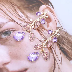 Elegant gold branch drop earrings with purple water drop crystals and pink rhinestones
