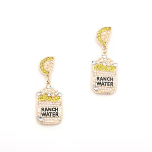 Boucles d'oreilles créatives en forme de boisson dorée avec perles et cristaux