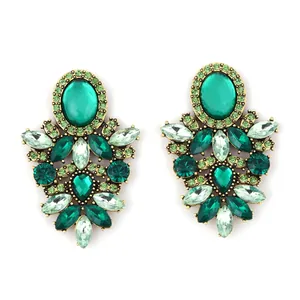 Luxurious vintage gold alloy drop earrings featuring vibrant green resin stones and rhinestones
