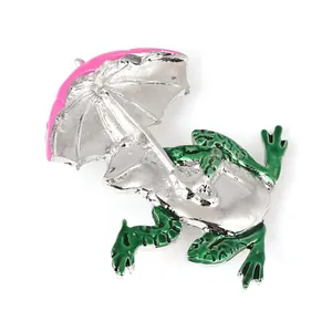 Kreative Legierungs-Froschbrosche mit rosa Regenschirm und grüner Emaille für Modeaccessoires