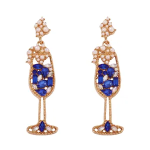 Elegant wine glass drop earrings with blue crystals, white pearls and gold plating