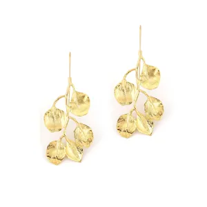 Fashionable golden leaf drop earrings with textured branch design for a natural look