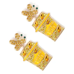 Sparkling butterfly and Pumpkin Spice cup earrings in gold alloy with colorful crystals