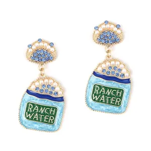 Boucles d'oreilles tasse à thé avec strass colorés et perles sur métal doré