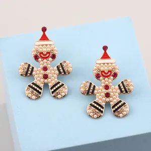Boucles d'oreilles bonhomme de pain d'épices avec perles blanches et strass