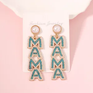 Detail of MAMA letter dangle earrings with blue rhinestones and white pearls for Mother's Day