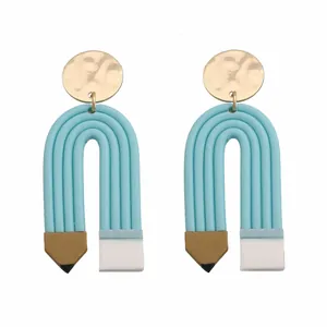 Creative blue pencil-shaped clay earrings with gold hammer texture metal studs