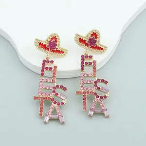 Gouden sombrero hoed oorbellen met paarse strass steentjes en een FIESTA hanger