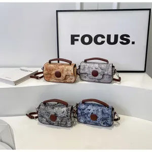 Retro printed flap handbags in four colors displayed on a minimalist tiered stand