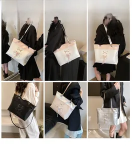 Detailed views of ballet-style large tote bags with lace-up ribbon and bow accents