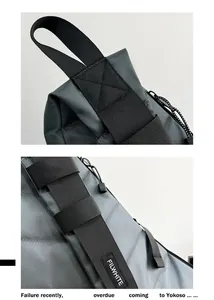 Detailed macro view of the durable grey fabric, reinforced stitching and black handle