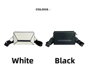 Detailed view of geometric crossbody bags in white and black with adjustable straps