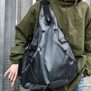 Men's large grey techwear crossbody bag with tactical buckles and bungee cords