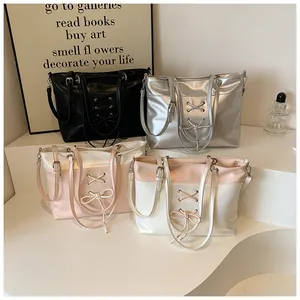 Detailed collection of contrast ballet-style tote bags with ribbon bows in four colors