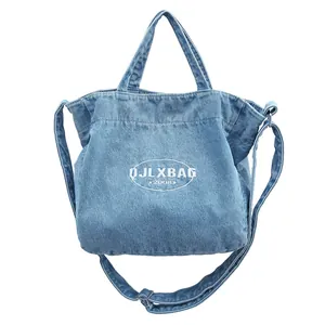 Large capacity blue denim shoulder bag with top handles and adjustable strap for women