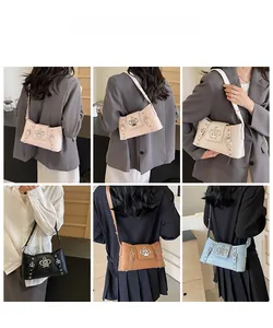 Close-up of stone pattern shoulder bags with fleur-de-lis metal detail in six colors