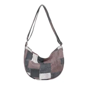 Minimalist canvas hobo bag with contrast patchwork design and adjustable strap