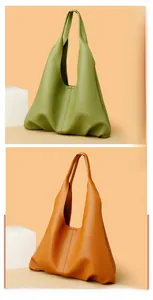 Close-up of high-quality lychee grain leather texture on soft green and orange hobo bags