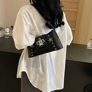 Black crocodile pattern shoulder bag with silver studs and fleur-de-lis metal buckle