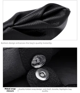 Detail view of black leather bag featuring magnetic snap closure and bottom fold stitching