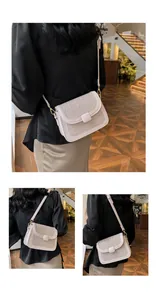 Detail of the woven texture and magnetic buckle on the cream crossbody flap bag