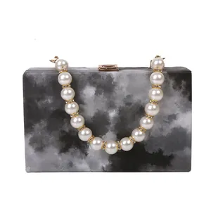 Fashionable marble pattern box bag with large pearl handle and gold clasp hardware