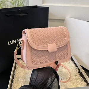Chic pink woven texture crossbody bag with gold buckle and elegant top handle