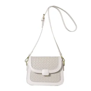Elegant woven beige crossbody bag for women with gold clasp and adjustable strap