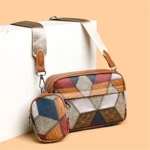 Retro patchwork crossbody bag with multi-color geometric patterns and wide nylon strap