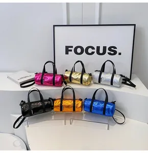 Collection of vibrant metallic mini cylinder bags in various colors on display stand