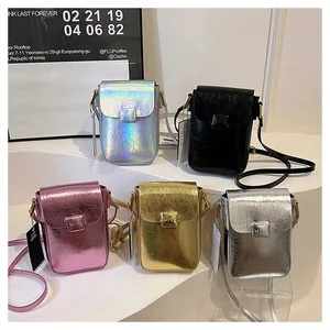 Five metallic mini crossbody phone bags in trendy candy colors on white steps display