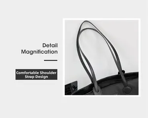 Detail of high-density black nylon tote bag featuring comfortable double shoulder straps