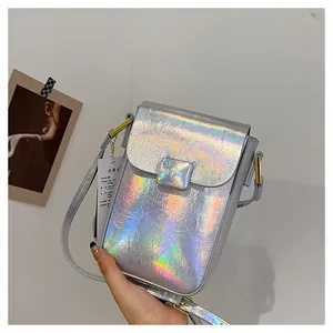 Detailed macro shot of holographic silver phone bag with pleated texture and silver chain