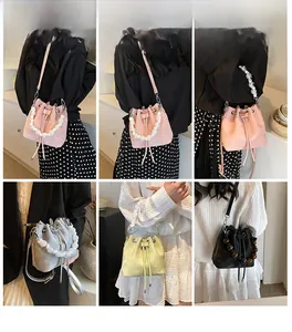 Detail shots of trendy drawstring bucket bags with pearl handles in multiple colors