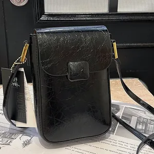 Mini black crossbody phone bag in retro wrinkled PU leather with golden hardware