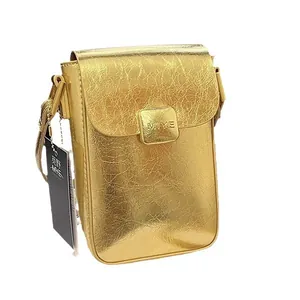 Minimalist metallic gold mini crossbody phone bag with irregular crinkle texture finish
