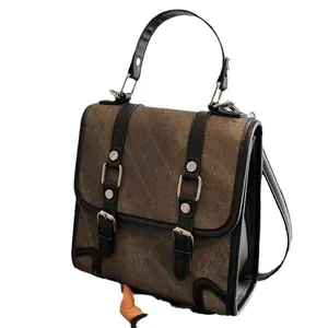 British style vintage canvas backpack with black leather straps and silver buckles
