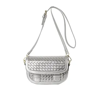 Silver woven leather crossbody saddle bag with adjustable strap and metallic finish