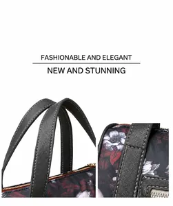 Detailed macro view of cross-grain leather texture and precise stitching on skull print handbag