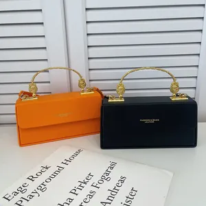 Sac à bandoulière carré en cuir PU avec poignée dorée en couleurs orange et noir