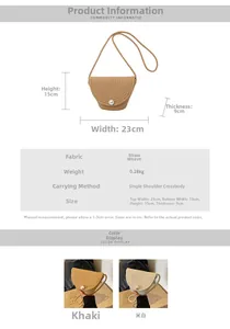 Detail showing dimensions of 23x15x9cm on woven straw crossbody bag with pearl buckle